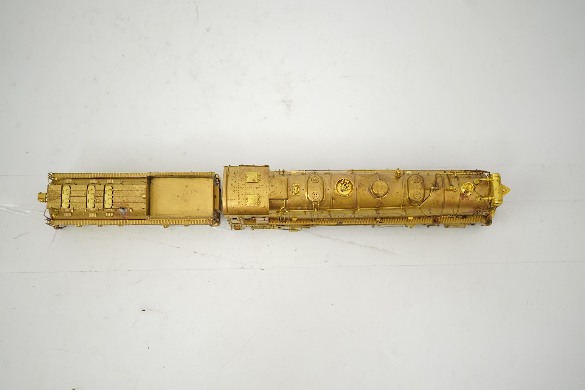A boxed HO gauge VH Scale Models unpainted brass model of Canadian National Railways T-2a, 4100, 2-10-2 locomotive with bogie tender, powered for two rail operation.